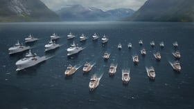 A fleet of Vanguard vessels at sea.