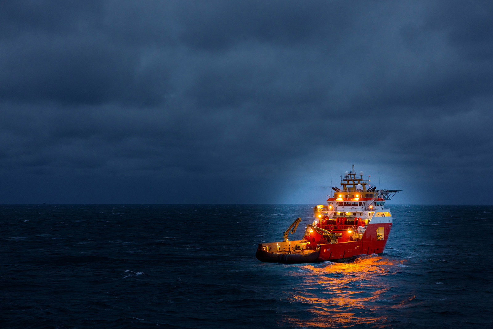 Normand Drott out sailing at night.