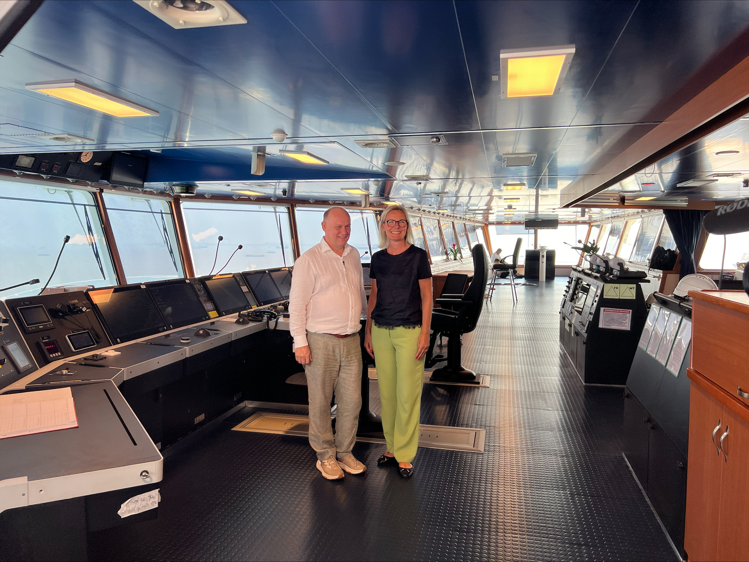 Lisa Edvardsen Haugan and Andreas Enger at the bridge of Hoegh Aurora
