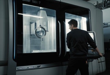 KONGSBERG employee working with tooling machine