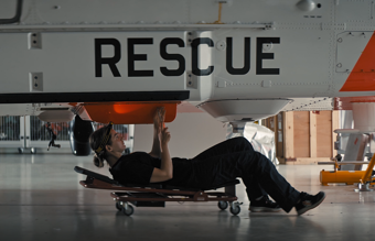 KONGSBERG employee inspecting SeaKing helicopter
