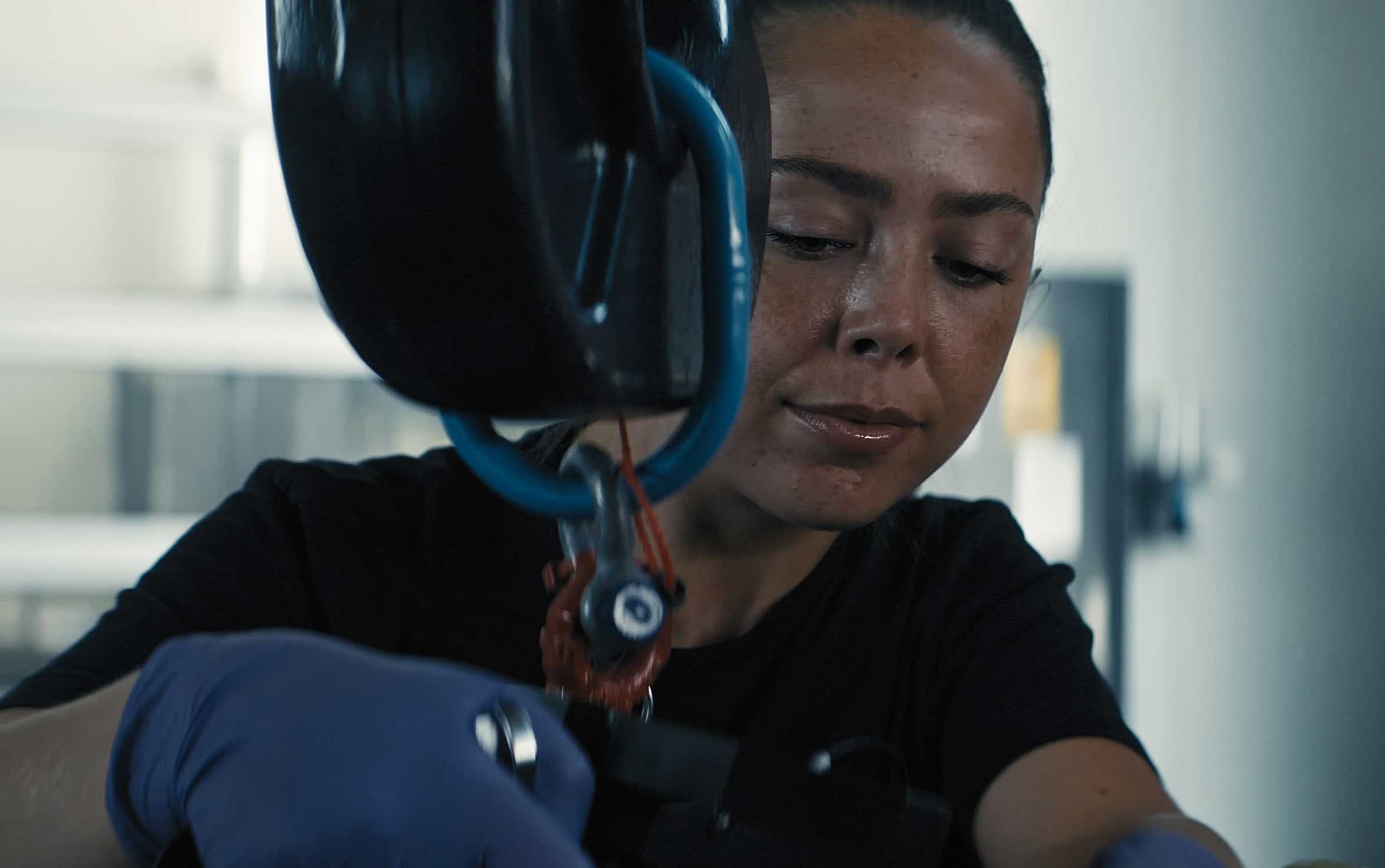 KONGSBERG employee doing repair on helicopter gearbox