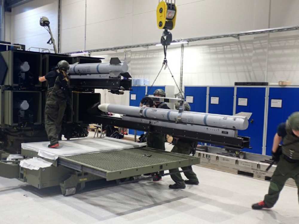 norwegian-technical-support-staff-loading-amraam-missiles-into-the-australian-armys-nasams-mk-2-canister-launcher.jpg