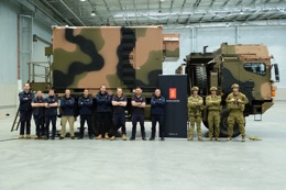 Kongsberg Defence Australia’s NASAMS Production Team with soldiers from 16 Regiment, Royal Australian Artillery, during a recent fitment check of the Fire Distribution Centre on the HX-40M vehicle.