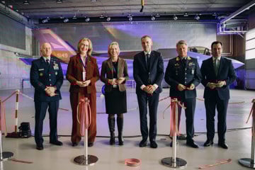 Image of people in front of F-35