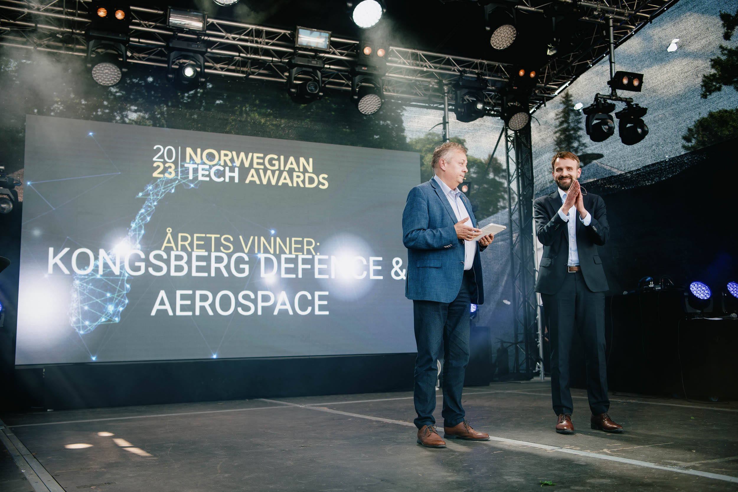 Image of two men on stage