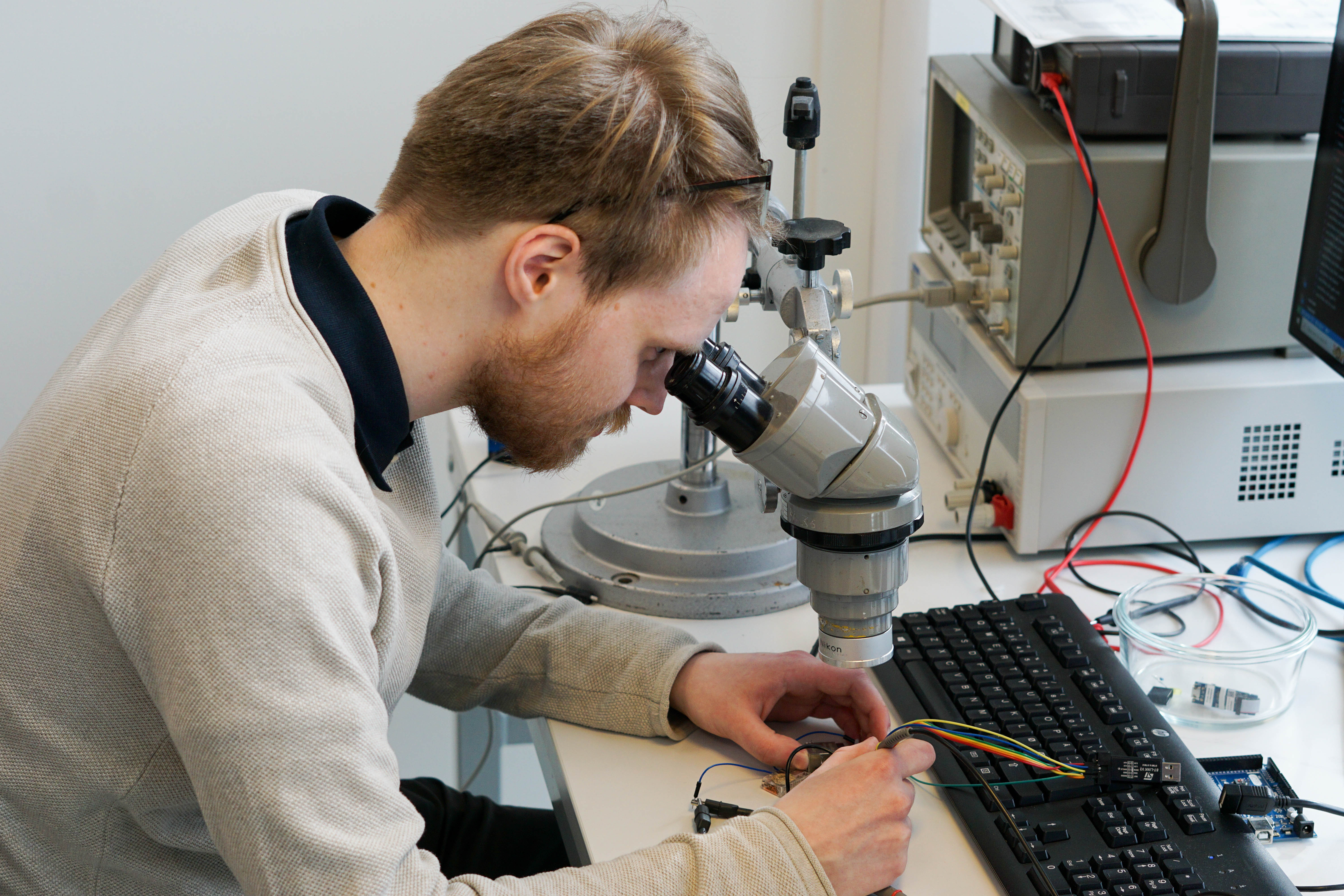 Image of a man working in a lab