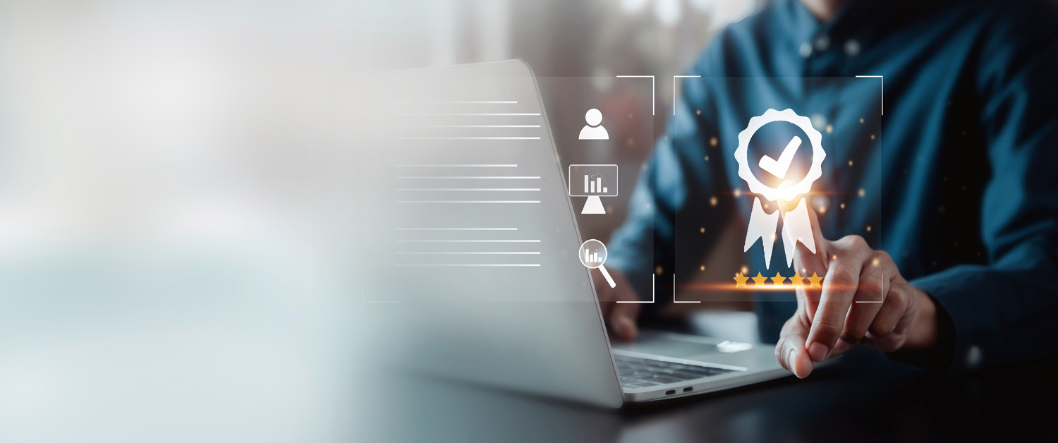 Illustration photo of a person sitting in front of a laptop computer.