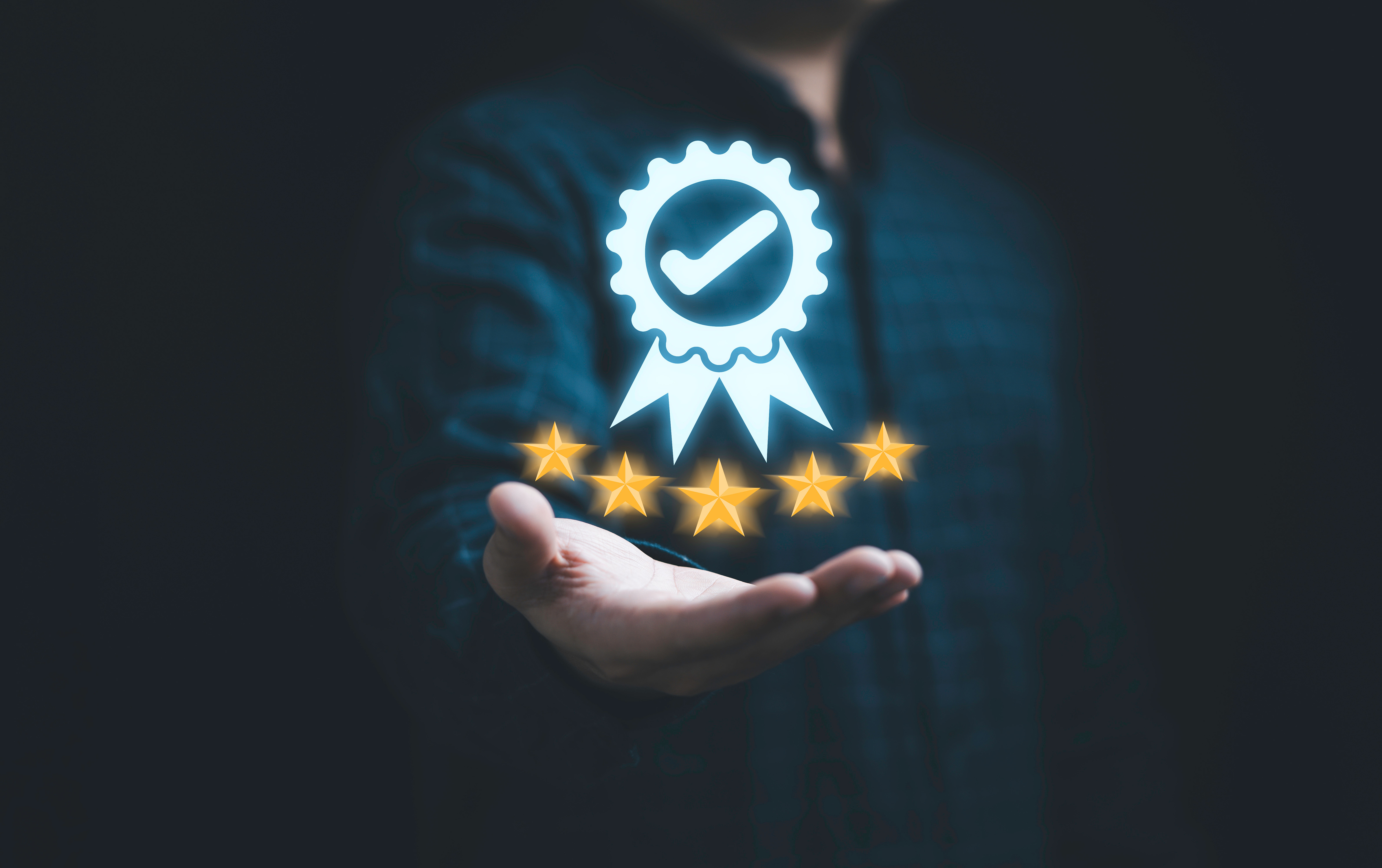 Illustration image - a hand "holding" a certification icon with 5 stars below.