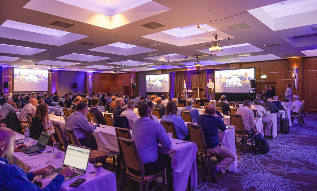 People at a conference listening to a presentation