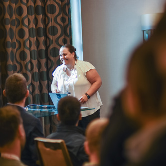 Woman presenting at a workshop
