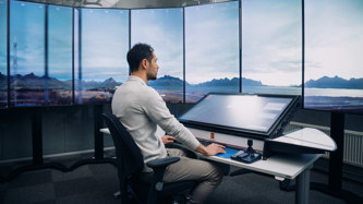 Image of man working with remote towers