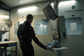 KONGSBERG employee working with measuring machine