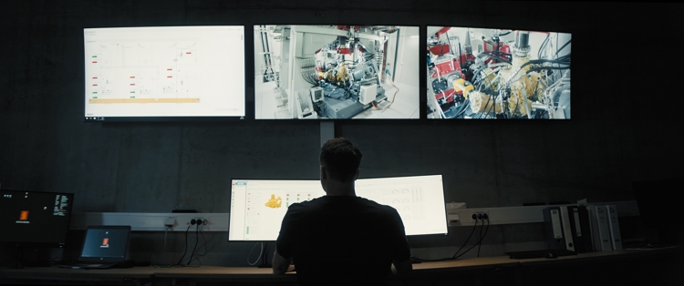 Man monitoring helicopter test rig at KONGSBERG