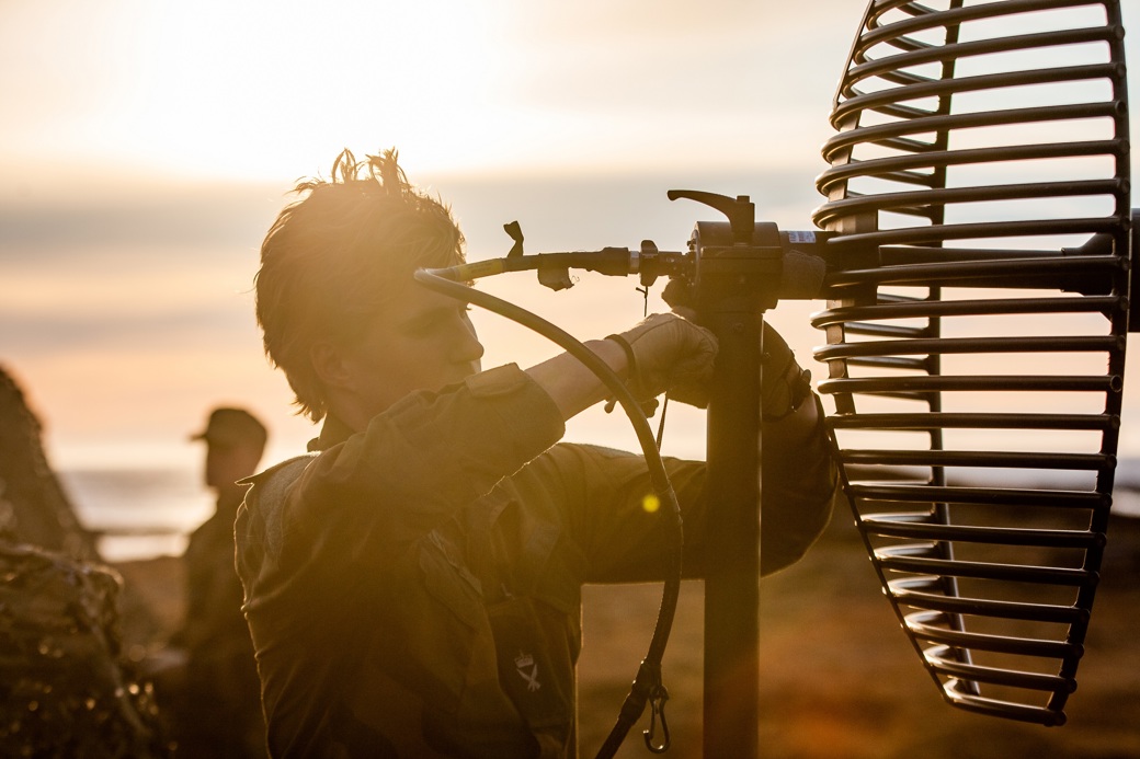 Soldier installing Tactical Communications Systems (K-TaCS)