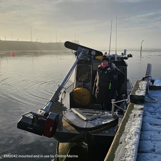 Image of EM2042 mounted on a boat at the dock.