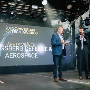 Image of two men on stage