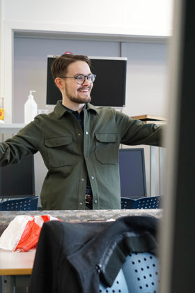 Image of man working with rocket components