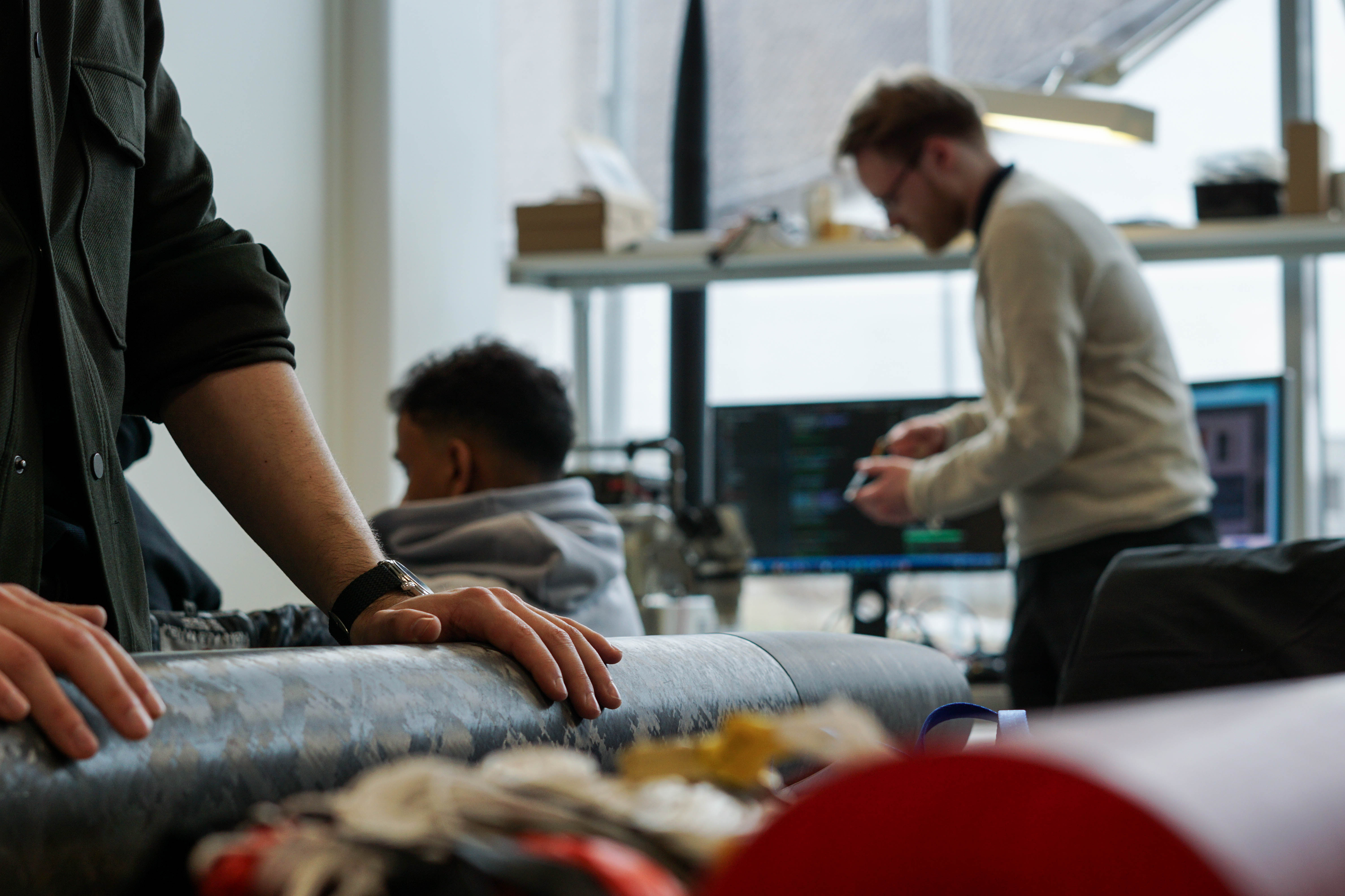 Image of a man holding a rocket