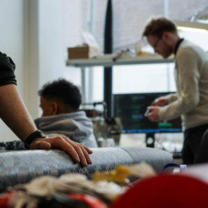 Image of a man holding a rocket